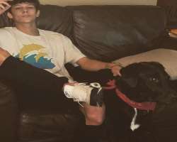 He also has a big black dog in his family.